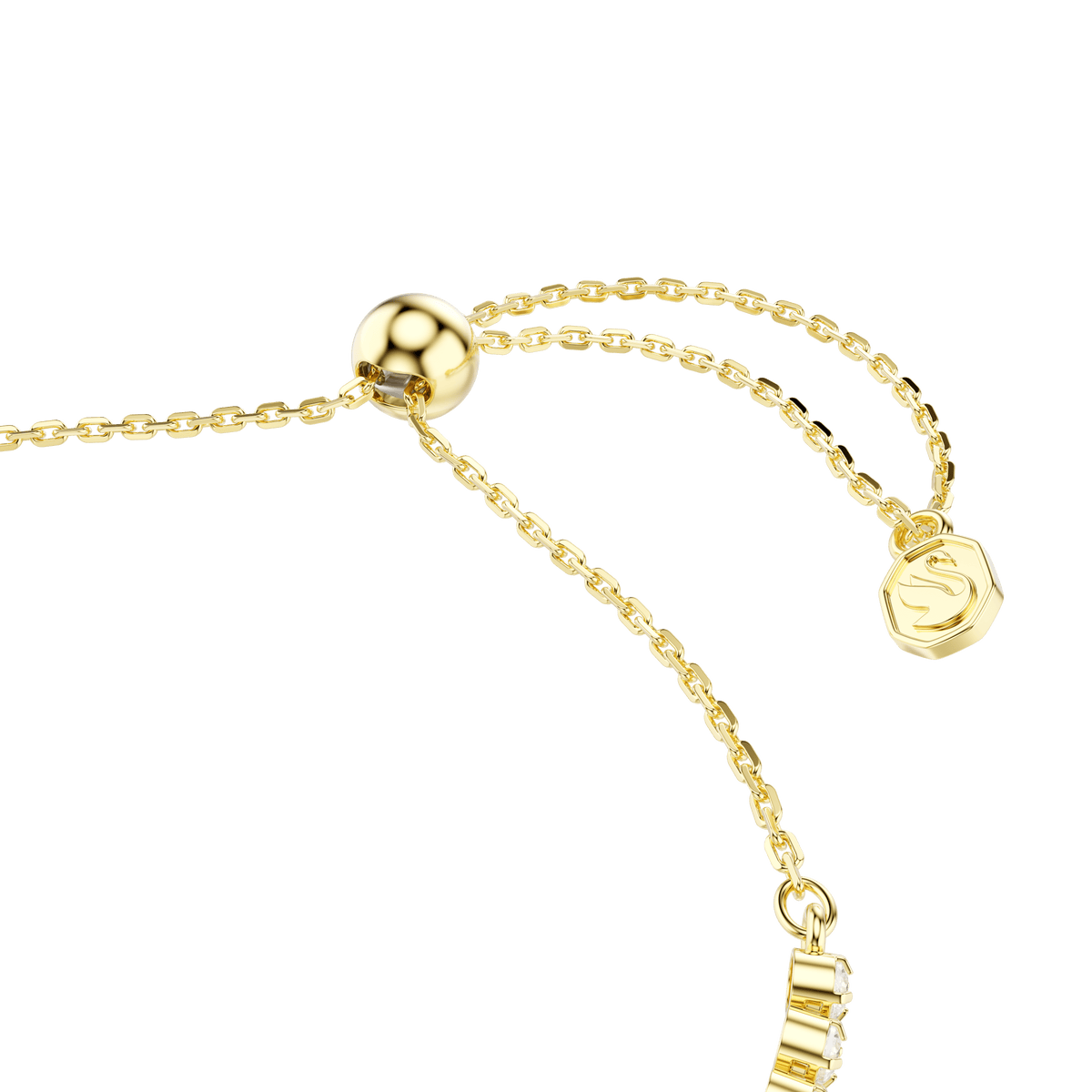 Close-up of the Swarovski Idyllia bracelet, featuring an 18K gold finish adjustable chain with a round slider clasp and a heart-with-arrow charm adorned with mixed cuts in white. This elegant piece captures the signature brilliance of Swarovski, offering timeless sophistication.