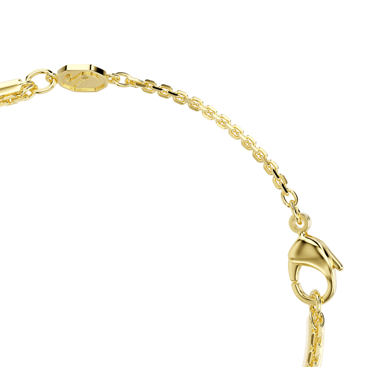 A close-up of the Swarovski Mesmera bracelet by Swarovski, featuring mixed cuts and a radiant 18K gold finish, showcases its elegant details against a plain white background.
