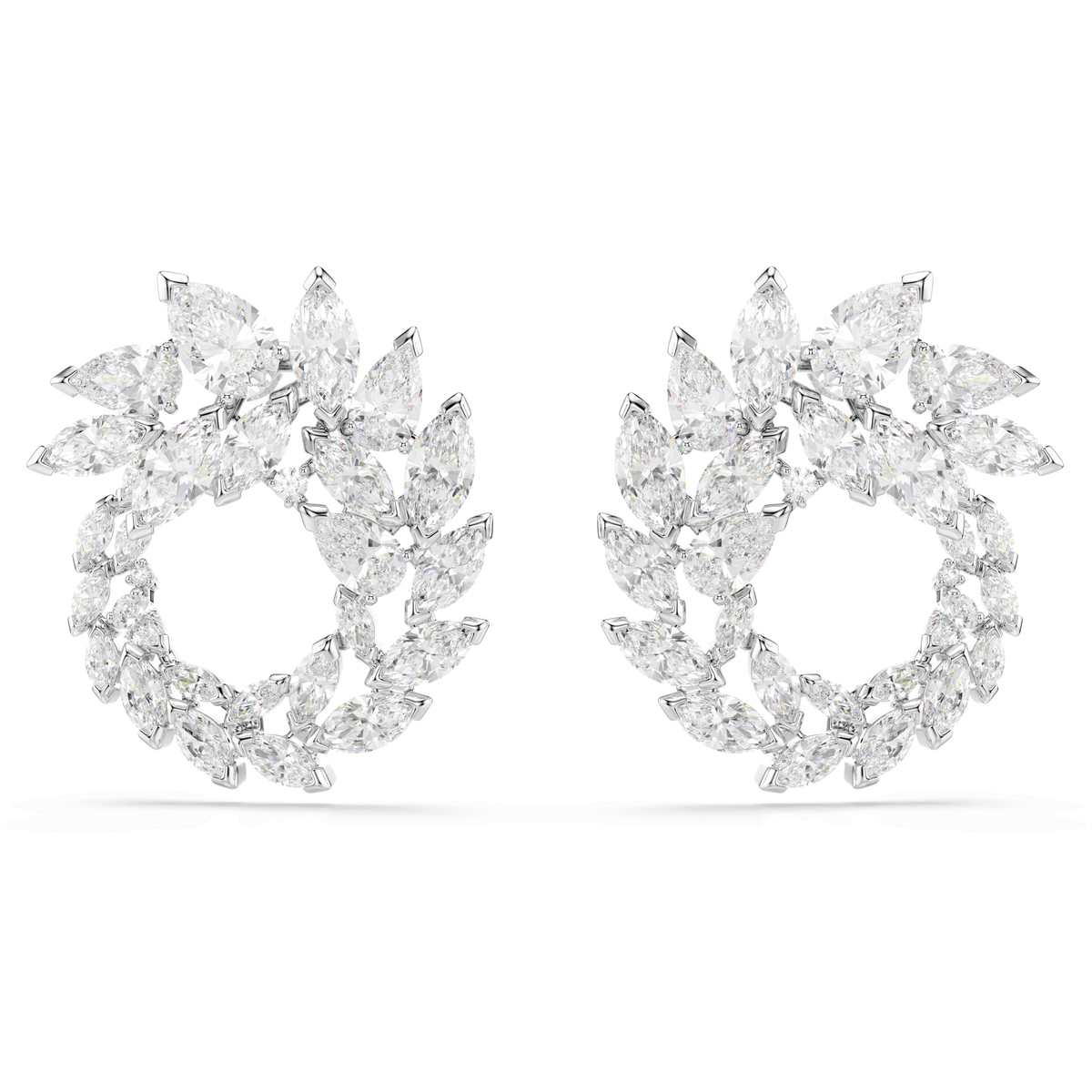 Presenting the Swarovski Mesmera hoop earrings by Swarovski—these circular hoops feature marquise-cut clear crystals arranged in a leaf-inspired pattern, crafted with sparkling Swarovski Zirconia and finished in rhodium-plated white metal. Shown against a plain white background.