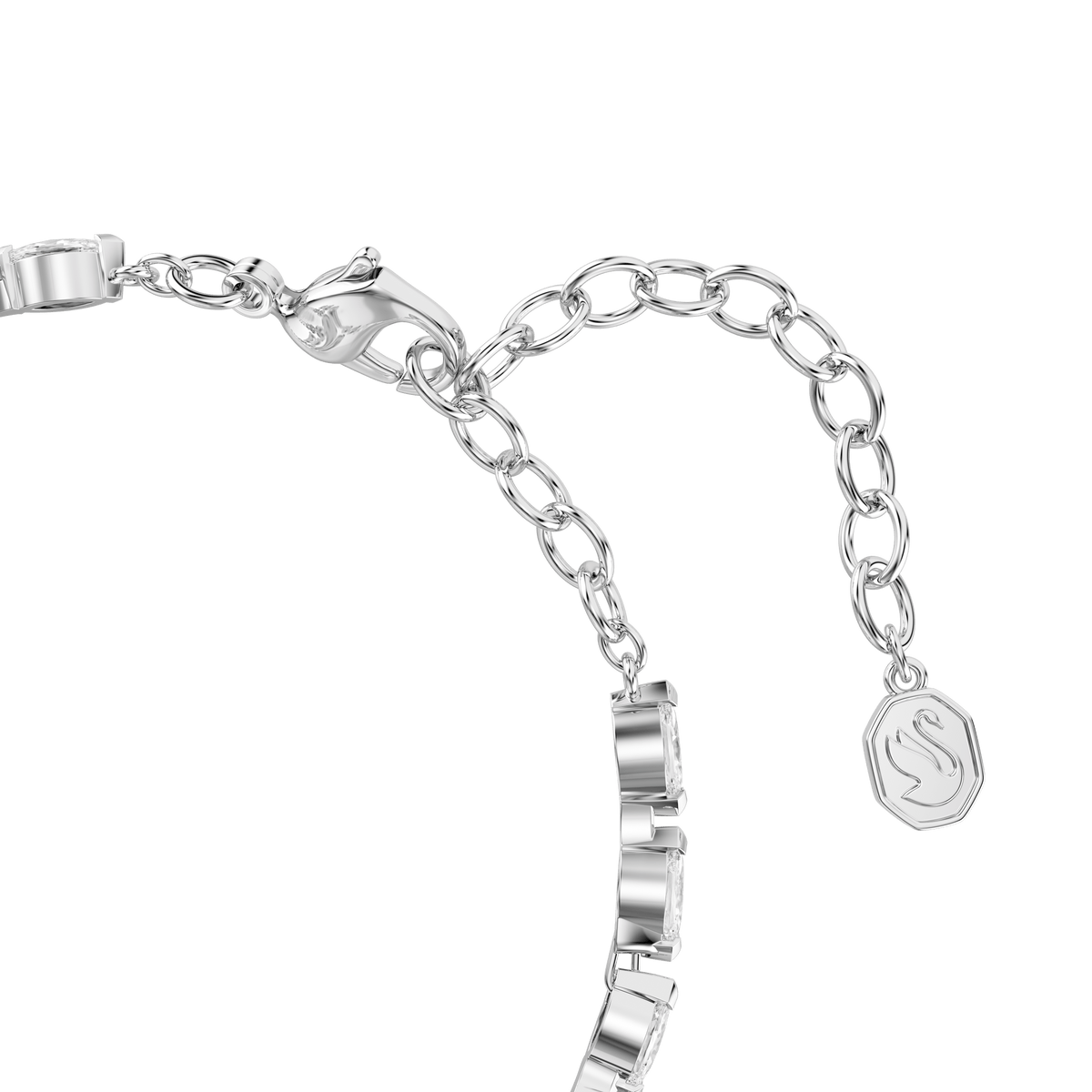 Discover the Swarovski Mesmera bracelet: a rhodium plated chain adorned with shimmering marquise-cut white stones, featuring an adjustable lobster clasp and finished with a delicate octagonal charm engraved with the Swarovski “S.” This elegant piece reflects modern jewelry design, blending timeless Swarovski craftsmanship with contemporary sophistication.