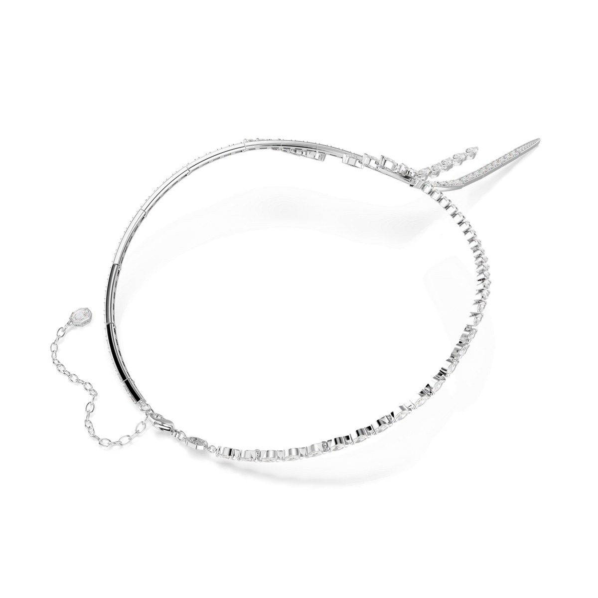 The Swarovski Mesmera Y necklace, featuring mixed-cut sparkling Swarovski Zirconia and finished in lustrous rhodium plating, adds refined elegance to your evening jewelry collection. This striking piece, displayed on a white background, boasts a delicate chain with geometric links and a pointed, spike-like end—perfect for elevating any look.