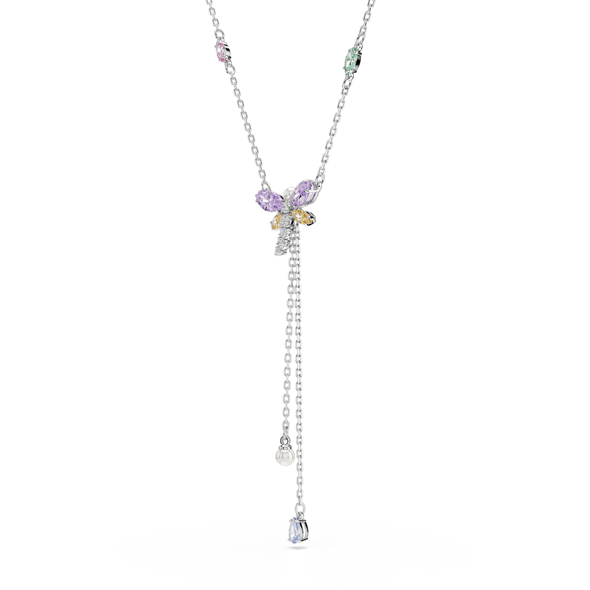 Introducing the Swarovski Ariana Grande x Swarovski Y necklace—a rhodium-plated piece adorned with a dragonfly-shaped cluster of mixed-cut, multicolored gemstones and two elegant dangling chains, each tipped with a sparkling Swarovski Zirconia for added brilliance.