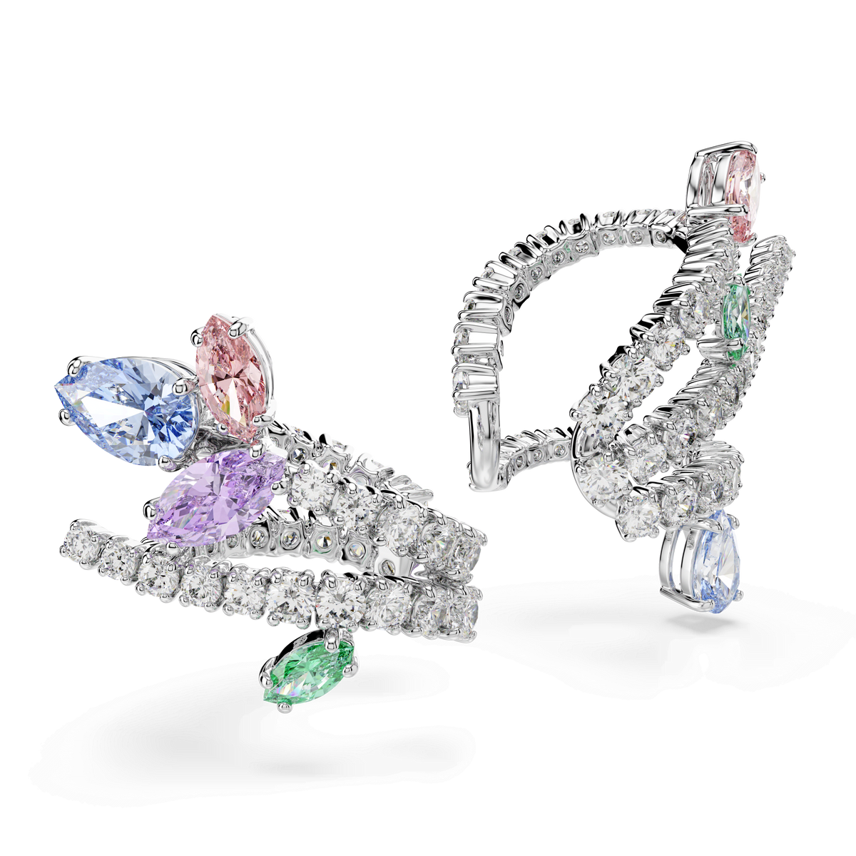 The Swarovski Ariana Grande x Swarovski ear cuffs feature an elegant, curved design crafted in rhodium plating and embellished with sparkling multicolored gemstones in mixed leaf-shaped and round cuts.