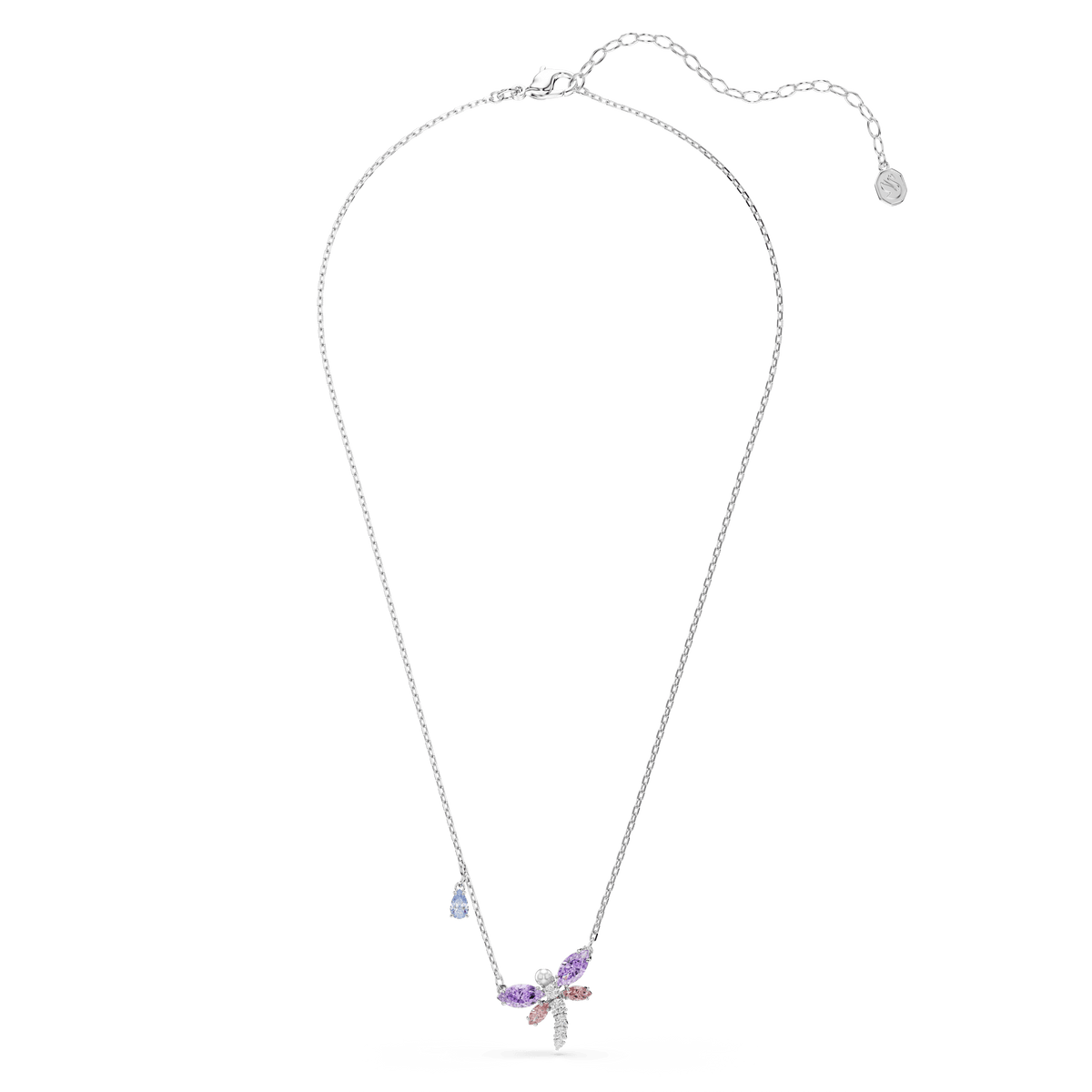 The Swarovski Ariana Grande x Swarovski pendant is a rhodium-plated silver necklace featuring a multicolored dragonfly pendant with mixed-cut stones, including shimmering Swarovski Zirconia and a small blue teardrop charm, elegantly displayed on a white background.