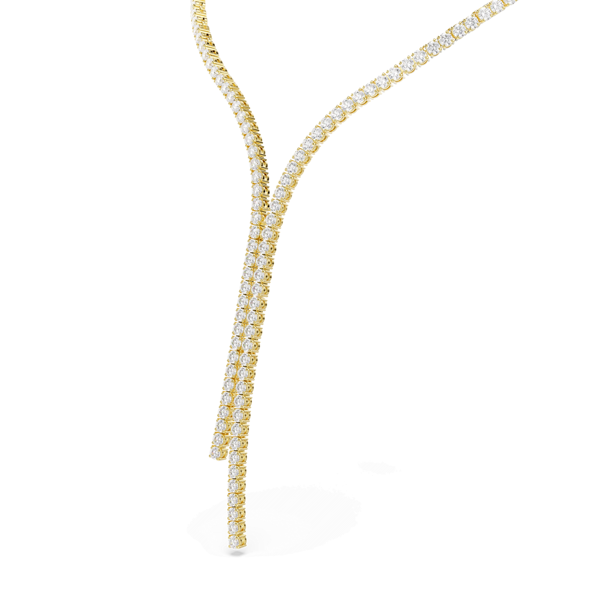 The Swarovski Matrix Y necklace by Swarovski features two strands of round-cut, white Swarovski Zirconia set in an 18K gold finish, elegantly crossing and cascading in a modern Y-shape against a white background—an exquisite piece of jewelry that radiates sophistication.