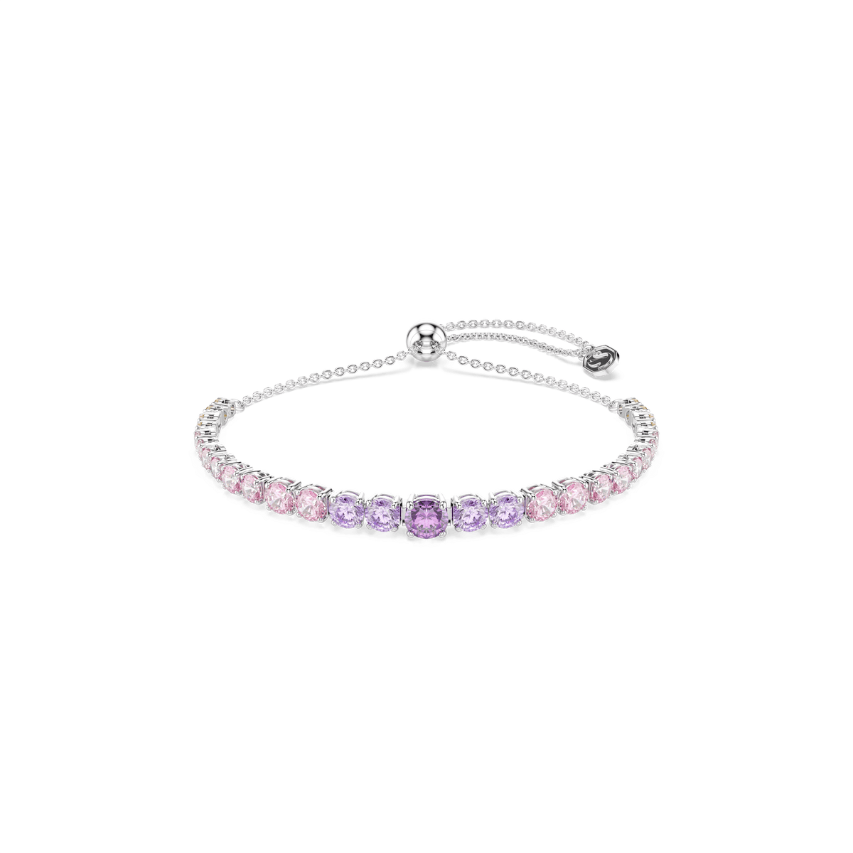 The Swarovski Matrix bracelet showcases a gradient of round-cut multicolored crystals in pastel pink and purple hues, set on a fine rhodium-plated chain with an adjustable sliding clasp, all presented against a white background.