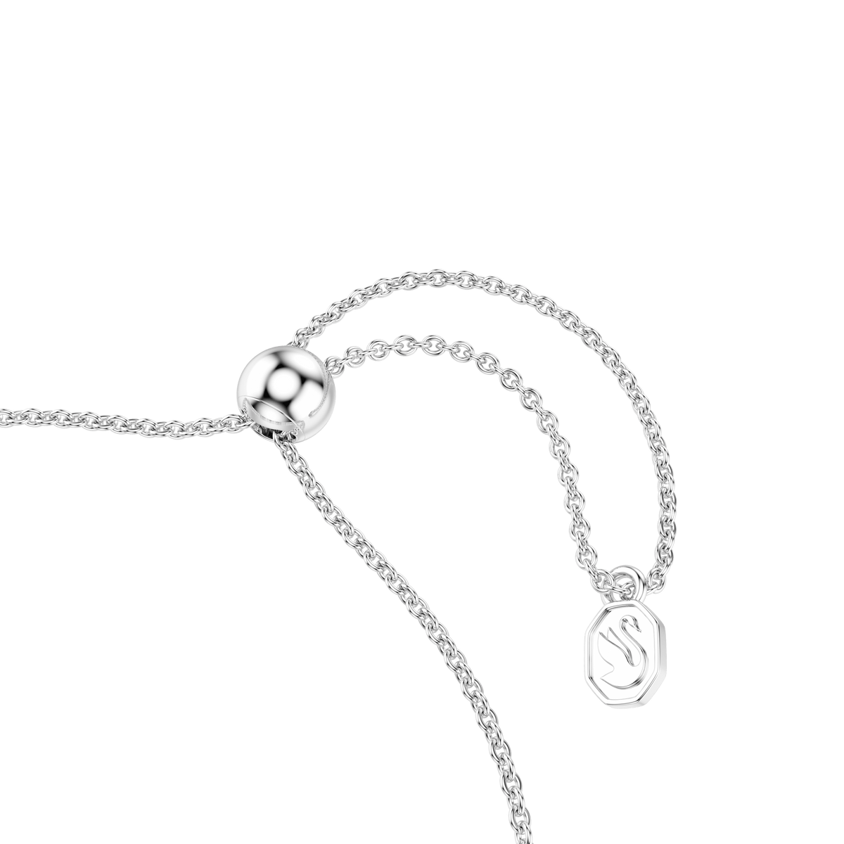 A close-up of the Swarovski Matrix bracelet, featuring a gradient of multicolored round cut crystals set on a delicate rhodium plated chain. The design includes a round sliding clasp and a small rectangular charm with an engraved motif, all showcased against a plain white background.