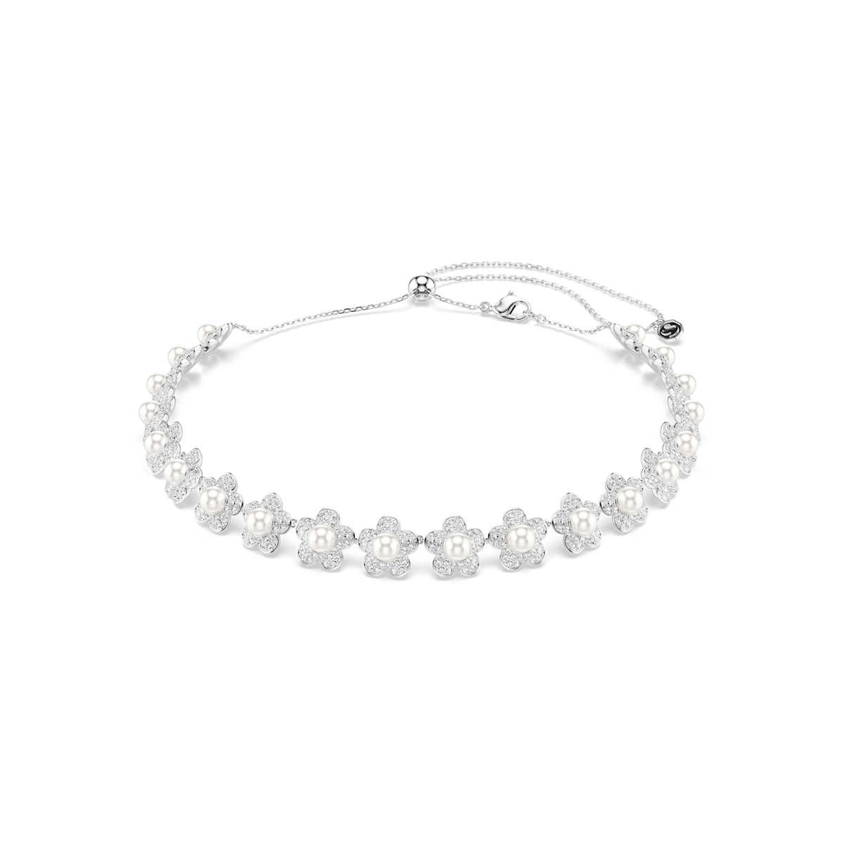 The Swarovski Ariana Grande x Swarovski choker, crafted in rhodium-plated metal and adorned with pearl-like Swarovski Crystal Pearls and round-cut clear crystals arranged in a graceful floral motif, exudes everyday luxury as it gleams softly against a plain white background.