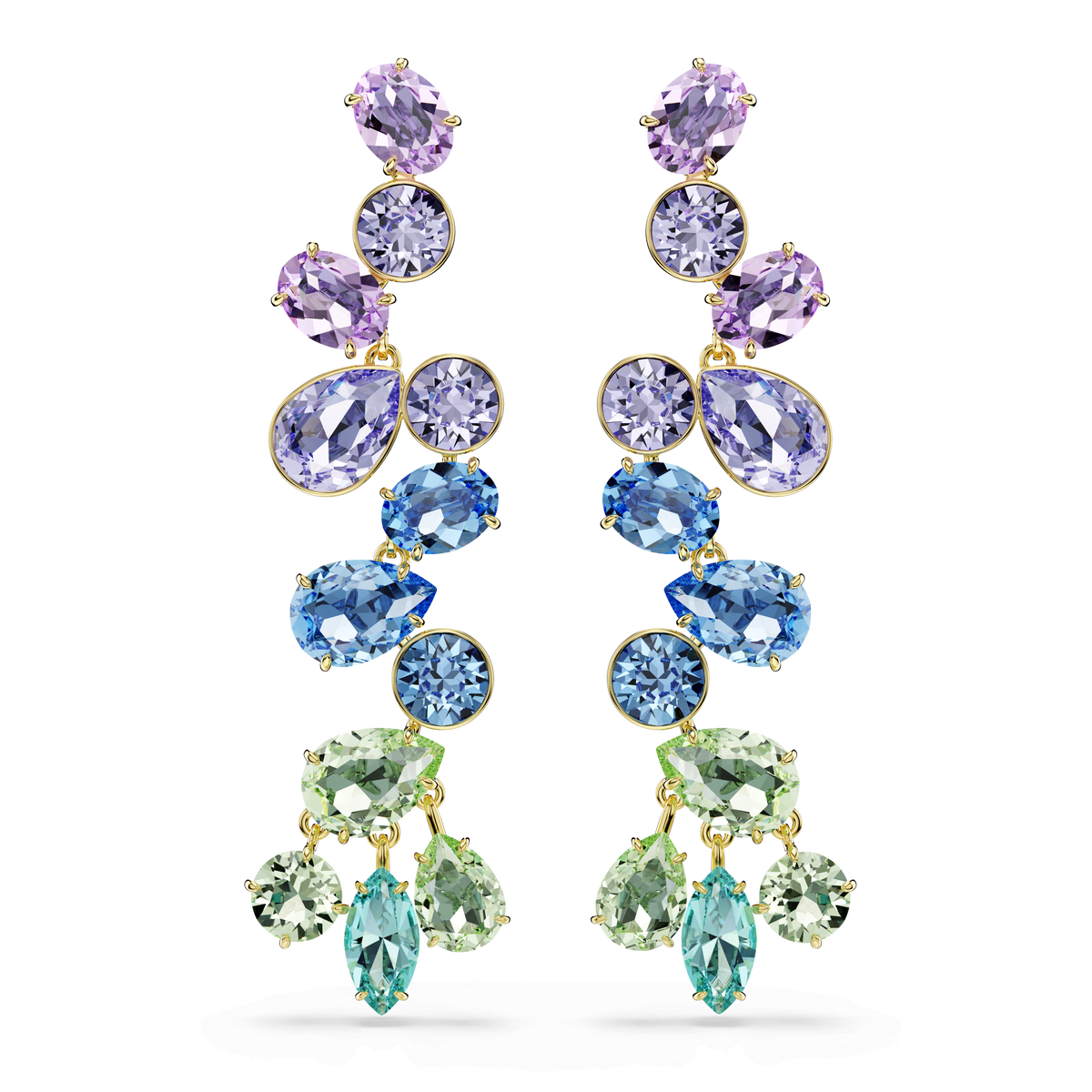 Introducing the Swarovski Gema drop earrings: long chandelier earrings featuring mixed-cut purple, blue, and green crystals in oval, teardrop, round, and marquise shapes arranged in a vertical gradient. Expertly crafted with a luxurious 18K gold finish, these striking multicolored earrings are a stunning statement from Swarovski.