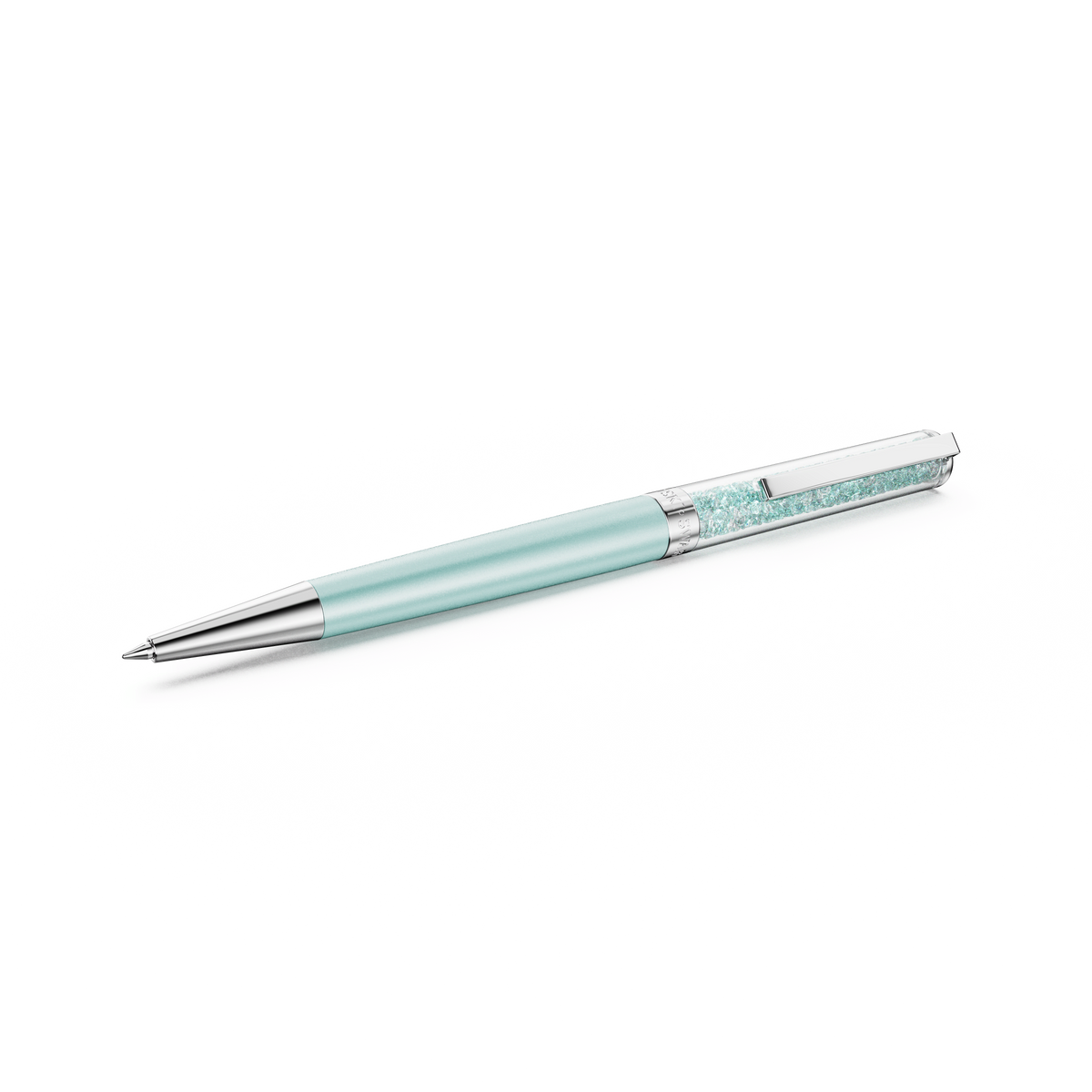 Set against a plain white background, the Swarovski SS Crystalline ballpoint pen in light green showcases a smooth, light green body accented with polished chrome clip and tip. The chamber is filled with sparkling crystalline, light green crystal chatons, reflecting the refined elegance synonymous with the Swarovski brand.