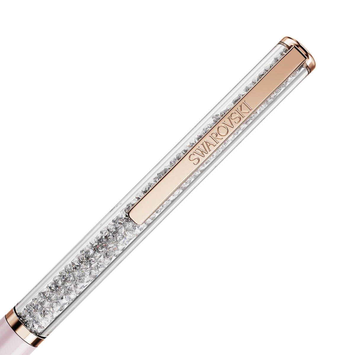 A close-up of the Swarovski SS Crystalline Ballpoint Pen in Crystal, Pink, and Rose Gold showcases its sparkling crystal accents and elegant rose gold details, complete with the Swarovski logo engraved on the metal clip—a luxurious accessory from Swarovski, available at Raffi Jewellers, your trusted destination for Swarovski Canada.