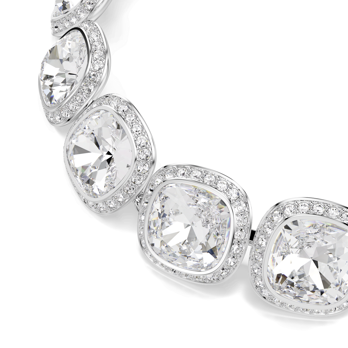 A close-up of the Swarovski Una Angelic bracelet, crafted with cushion-cut white stones reminiscent of crystal jewelry, each surrounded by smaller sparkling stones and finished with a rhodium-plated setting, displayed against a white background.