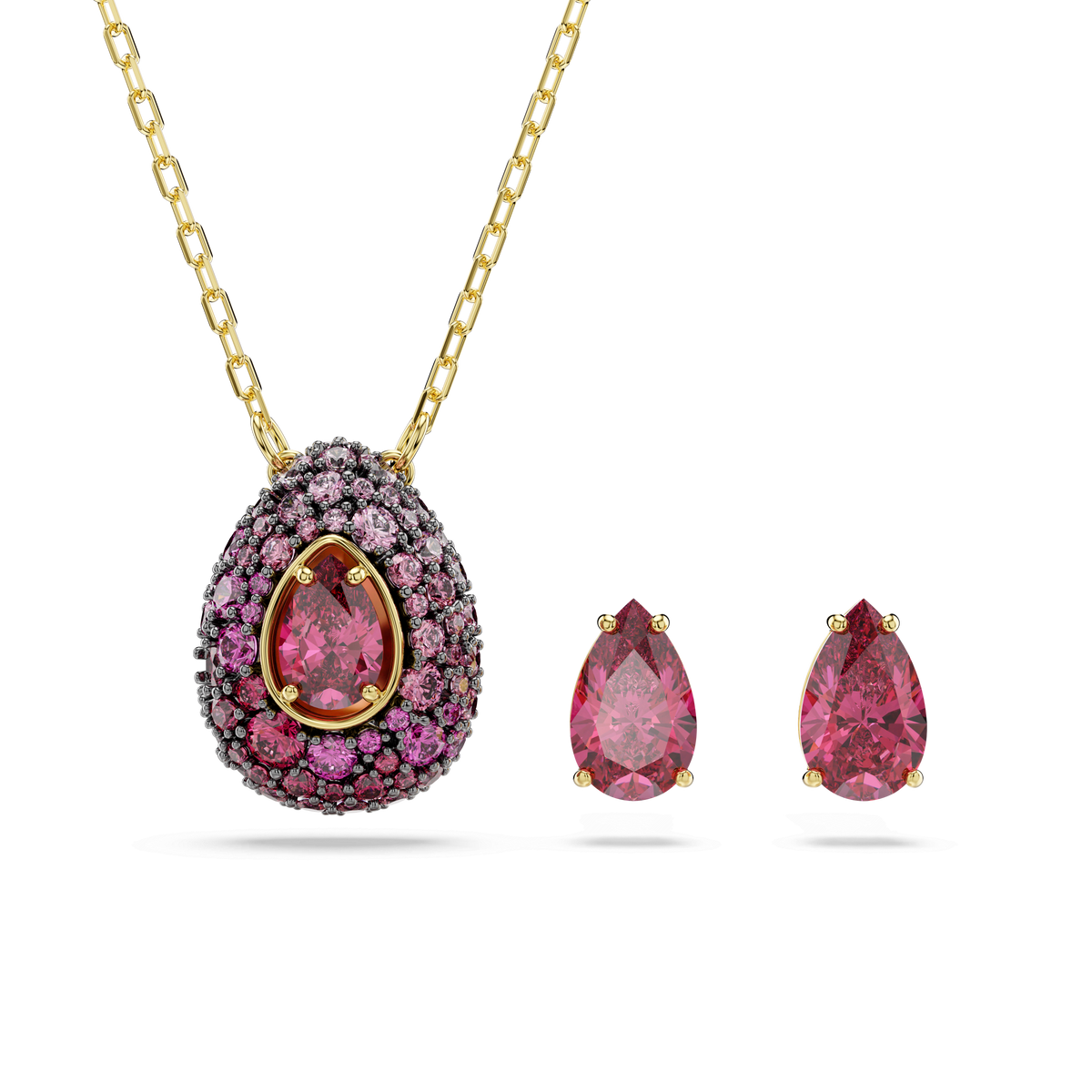 Elevate any outfit with the Swarovski Sublima set, featuring a pair of pear-cut red gemstone pendant earrings and matching necklace, all finished in elegant 18K gold. This vibrant two-piece jewelry set by Swarovski is beautifully displayed on a white background.