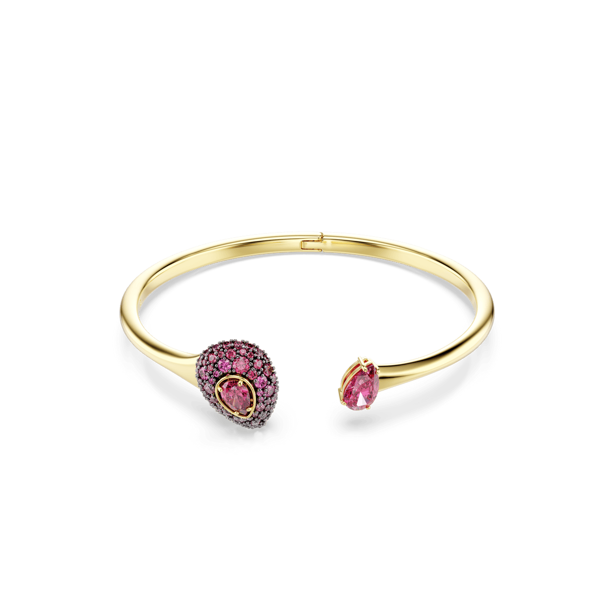 A Swarovski Sublima bangle with a pear-cut red Swarovski Zirconia and an 18K gold finish is displayed on a white background.