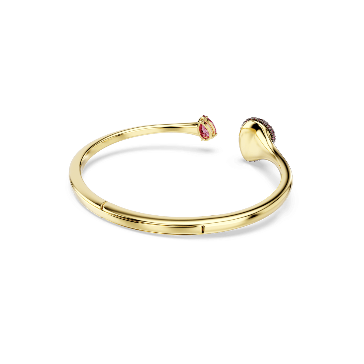 The Swarovski Sublima bangle features an elegant open cuff design with a pear-cut red gemstone on one end and a rounded decorative element embellished with sparkling Swarovski Zirconia on the other, all finished in luxurious 18K gold and set against a plain white background.