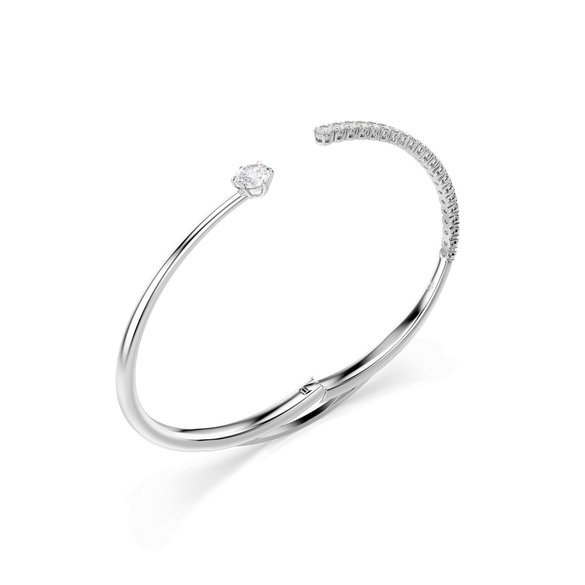 A stunning Swarovski Matrix bangle, featuring round-cut white Swarovski crystals and elegantly rhodium plated, is showcased on a white background.