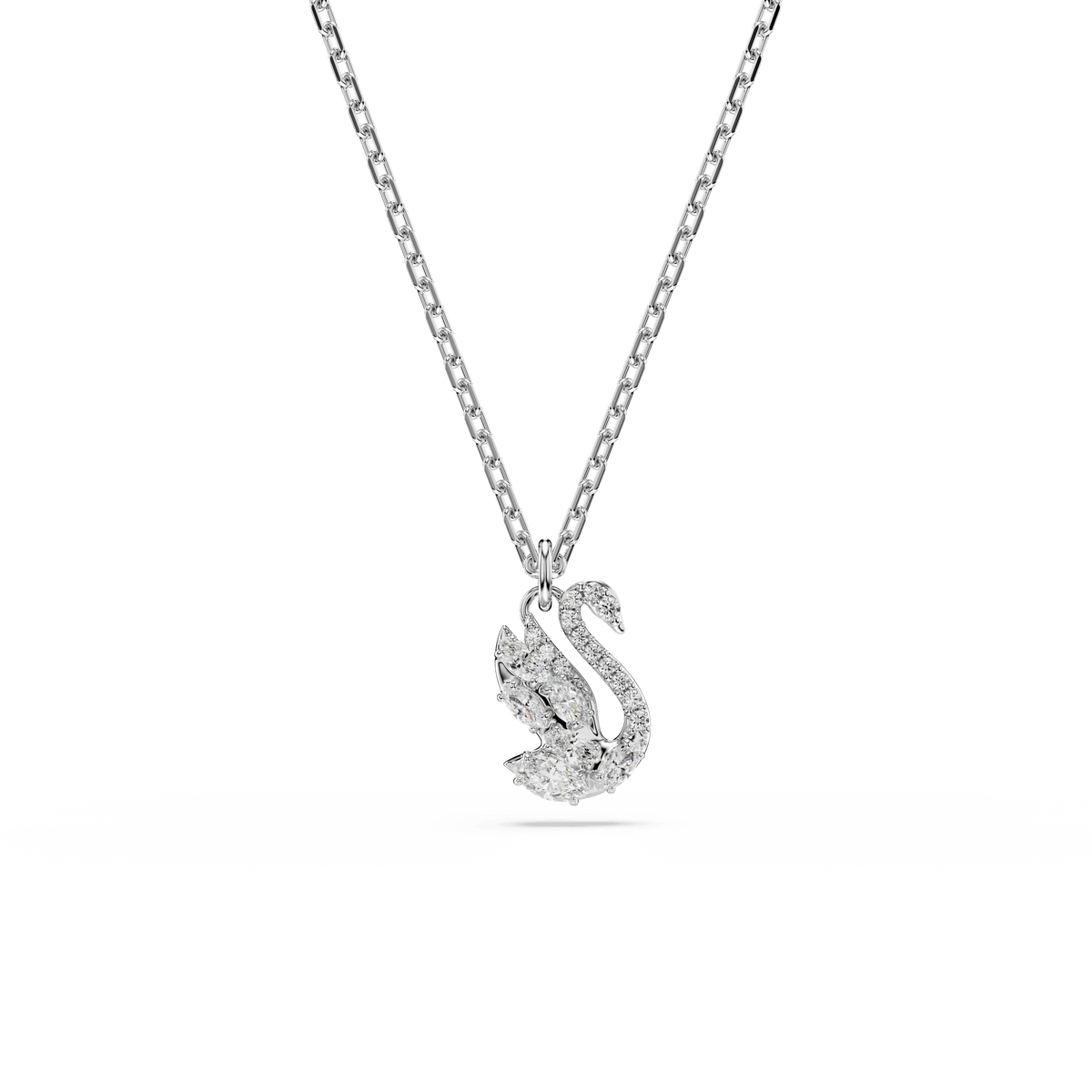 A rhodium plated Swarovski Swan pendant necklace, featuring mixed cuts and shimmering white crystals, showcased on a plain white background—a sophisticated Swarovski jewelry piece that exudes timeless elegance.