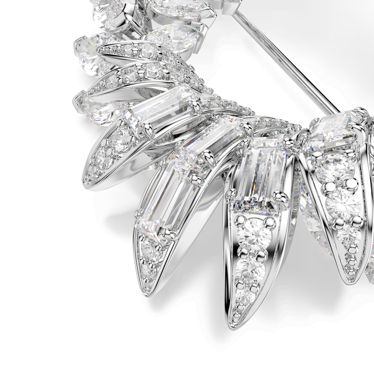 Close-up of the Swarovski Mesmera brooch, featuring brilliantly sparkling marquise-cut stones crafted from shimmering Swarovski Zirconia, elegantly set in intricate rhodium-plated prongs, showcasing exquisite craftsmanship and dazzling clarity against a white background.