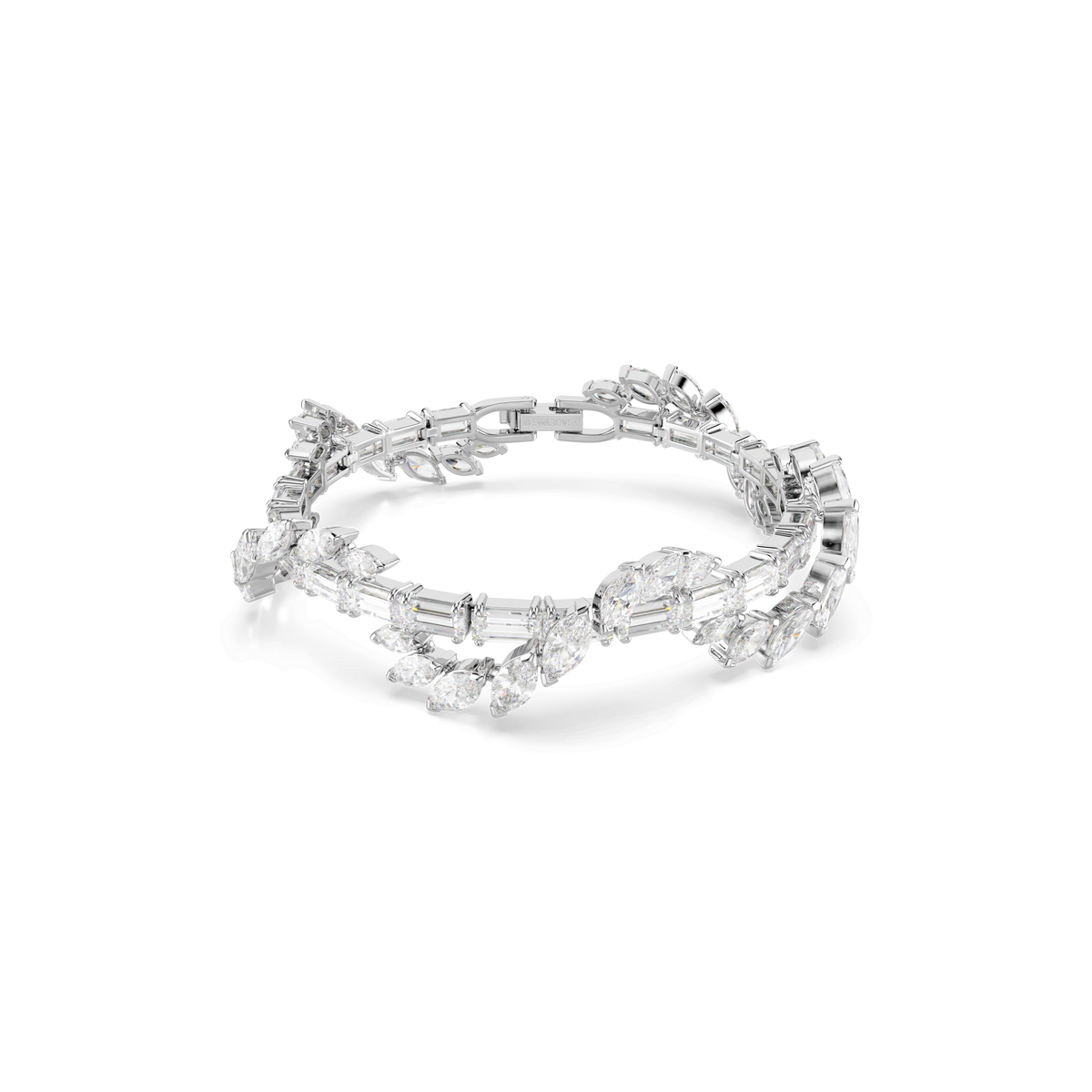 The Swarovski Mesmera bracelet by Swarovski features mixed-cut white Swarovski Zirconia gemstones set in a rhodium-plated, silver-toned layered design, arranged in an alternating elegant pattern and displayed on a plain white background—an exquisite and eye-catching piece of jewelry.