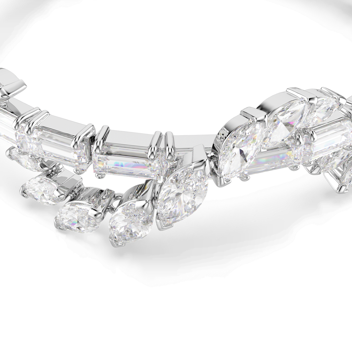 Close-up of the Swarovski Mesmera bracelet by Swarovski, featuring mixed-cut clear stones—including sparkling Swarovski Zirconia—in marquise, baguette, and round shapes, set in intricate rhodium plated, overlapping patterns against a white background.
