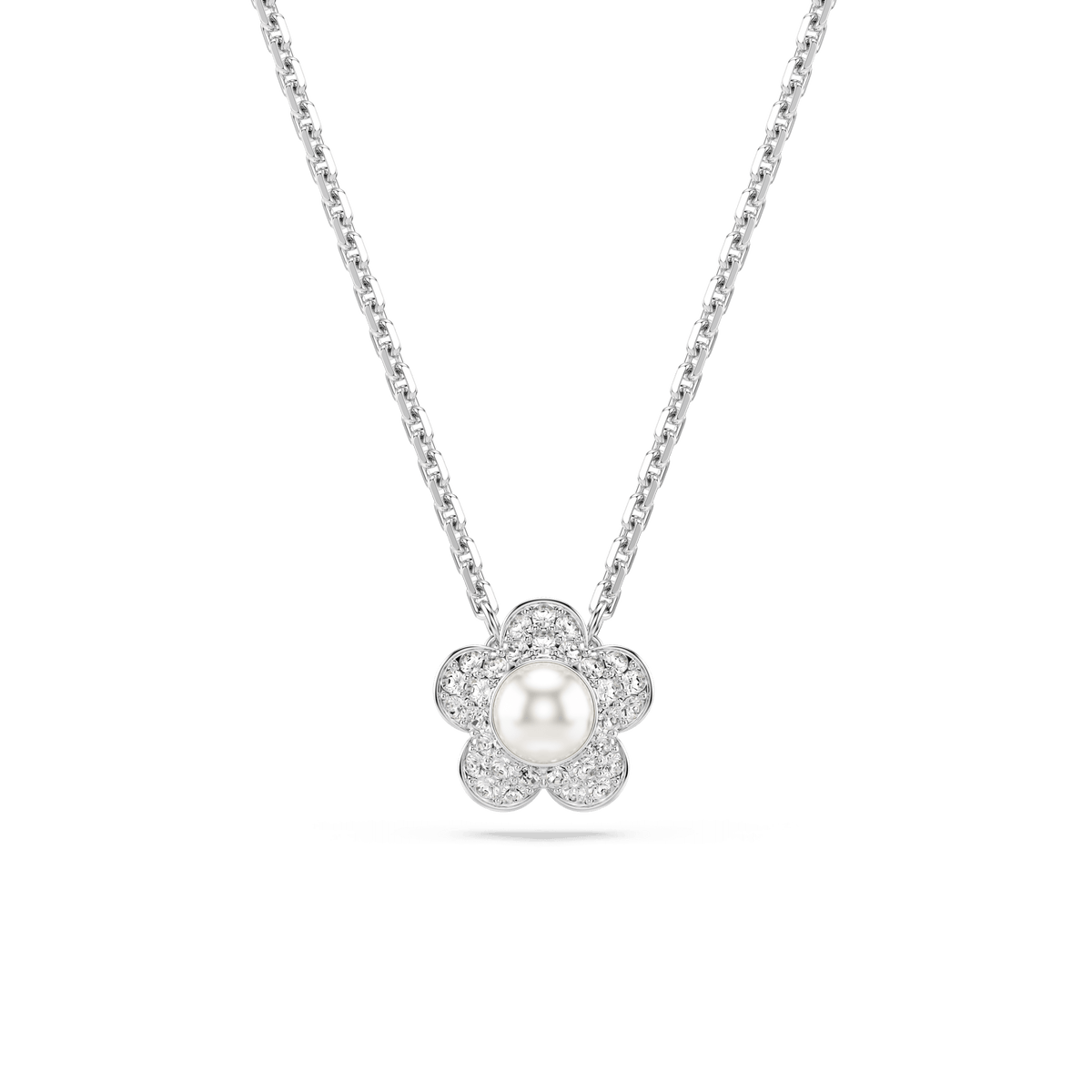 A Swarovski Ariana Grande x Swarovski pendant in a rhodium-plated, flower design, featuring a central white crystal pearl and round-cut stones pavé-set around the petals, is displayed on a plain white background.