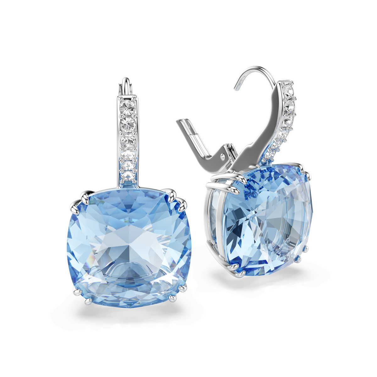 A pair of Swarovski Millenia drop earrings, featuring large cushion-cut blue crystals and delicate pavé detailing with small clear stones on the rhodium-plated clasps, displayed on a white background.