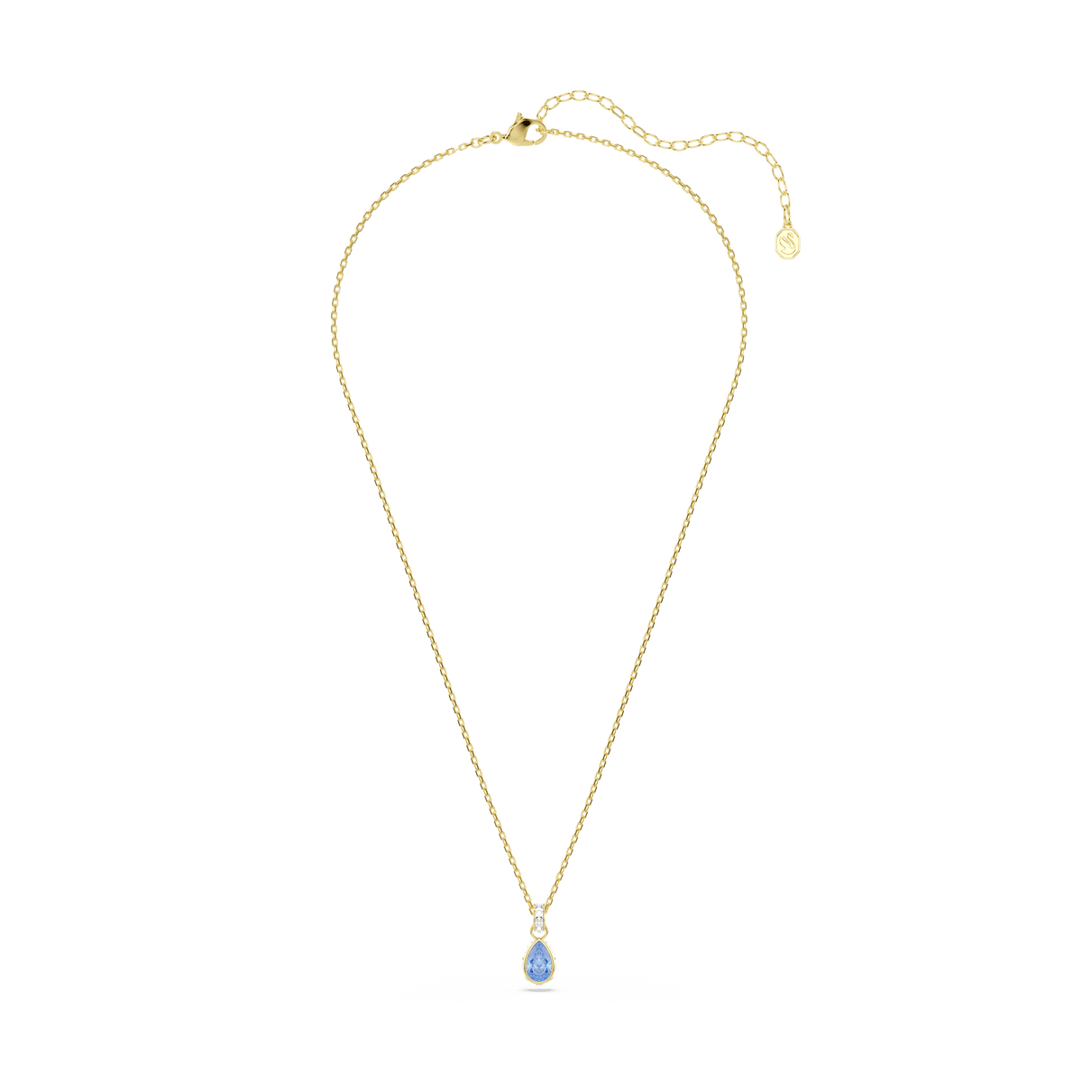 Swarovski Chroma pendant, featuring a pear-cut blue stone set in an 18K gold finish and an adjustable chain, is showcased against a plain white background. For a complete and elegant look, pair it with matching Swarovski earrings.