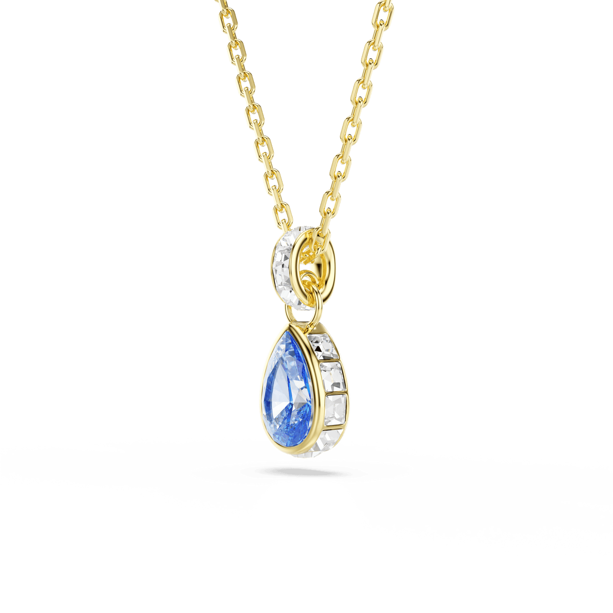 The Swarovski Chroma pendant features a pear-cut blue stone set in an 18K gold finish, accented with small white crystals on the loop above, displayed against a white background.