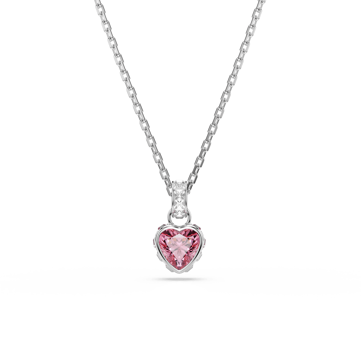 A rhodium-plated pendant from Swarovski’s Chroma collection features a delicate chain and a stunning pink heart-shaped crystal, accented by a small clear Swarovski Zirconia above the heart.