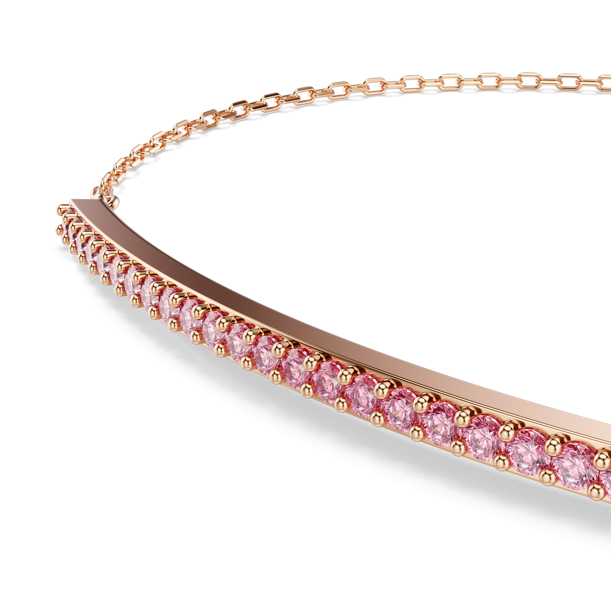 A close-up of the Swarovski Only bracelet reveals a curved bar pendant adorned with a row of small, round pink pavé stones, elegantly set along the bar. The delicate chain boasts an 18K rose gold finish, lending an elegant touch that echoes the refined sparkle of fine crystallized jewelry.