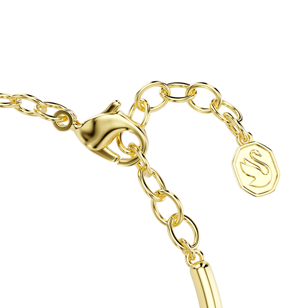 Close-up of the Swarovski Sublima bangle, featuring an octagon-cut green stone and an 18K gold finish, set against a plain white background—an elegant statement piece from Swarovski.