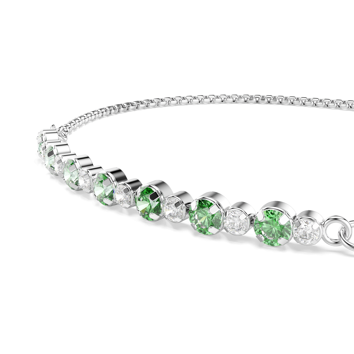 The Swarovski Matrix bracelet by Swarovski features round-cut green stones set in rhodium plating, showcasing a sleek, modern design inspired by an elegant DNA helix against a white background.
