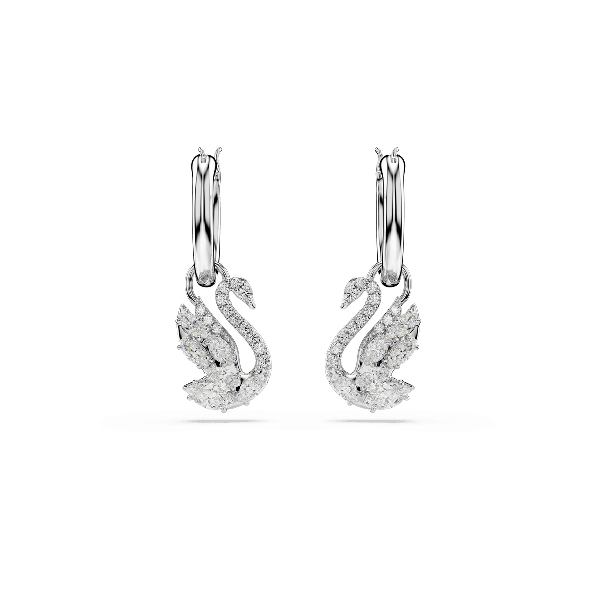 The Swarovski Swan drop earrings, featuring mixed cuts, evoke refined charm and sophistication with their graceful swan design and sparkling white crystals. Rhodium plated for a luxurious finish, these elegant Swarovski earrings beautifully catch the light when displayed against a plain white background.