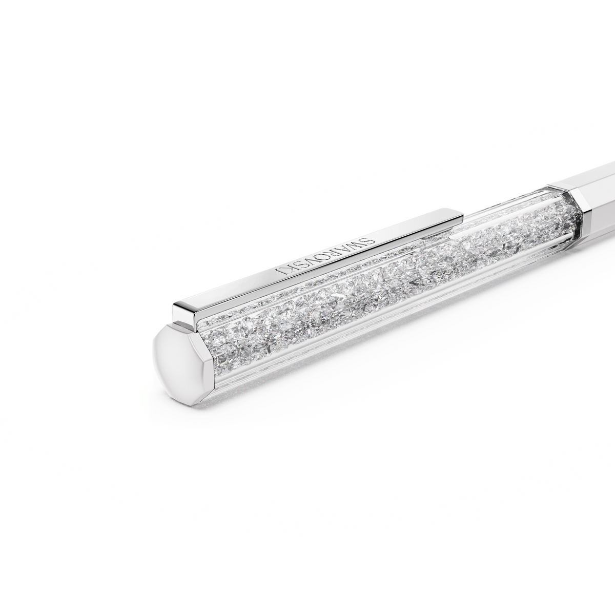 Here’s a rewritten sentence using the provided product data: A close-up of the Swarovski Crystalline ballpoint pen, featuring white lacquered finish and chrome-plated accents, filled with sparkling crystals for a touch of brilliance. Showcasing the brand’s signature Crystalline technique, this sleek pen displays elegant octagon contours and is adorned with a metallic clip engraved with “SWAROVSKI,“ all set against a white background.