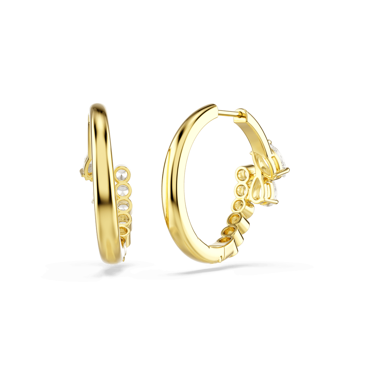 The Swarovski Mesmera hoop earrings, featuring mixed-cut white Swarovski Zirconia stones set along the inner bottom edge and finished in 18K gold, are displayed against a plain white background.
