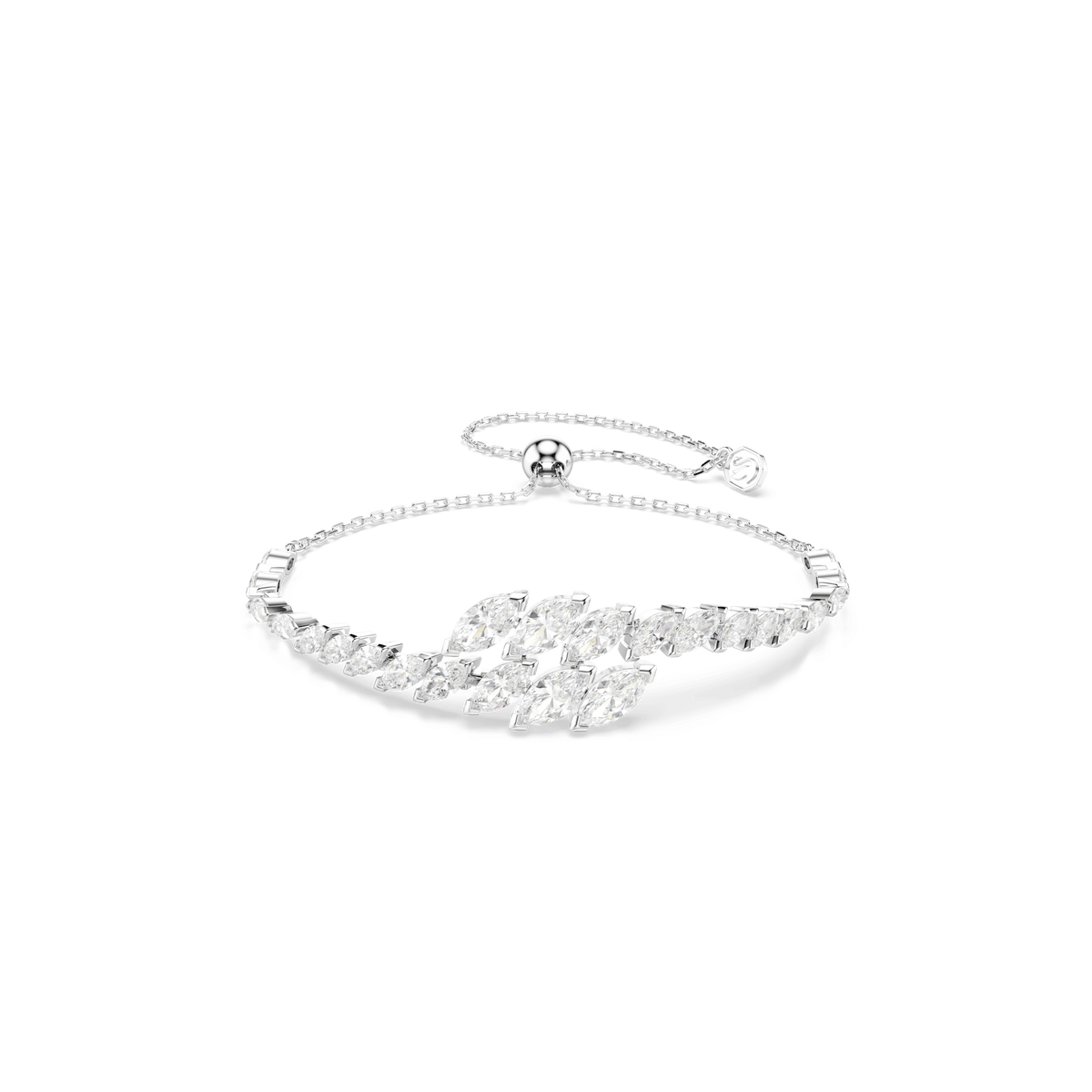 Rhodium-plated bracelet from the Swarovski Mesmera set, adorned with marquise-cut white crystals and exquisite Swarovski Zirconia arranged in a leaf-inspired cluster. Featuring an adjustable chain with a sliding clasp, this elegant accessory—part of the three-piece Swarovski Mesmera jewelry set—is perfect for holiday gifting. Shown on a white background.