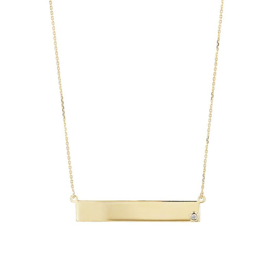The Raffi&Co.® 14K Yellow Gold and Diamond Engravable Pendant Necklace features a vibrant yellow gold bar pendant with a small diamond accent on the lower right corner, elegantly suspended from a delicate chain against a white background. This exquisite piece can be personalized to make it truly unique and special.