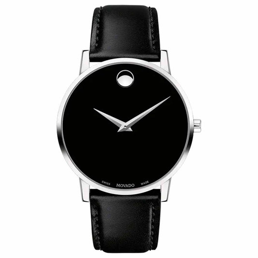 Embrace timeless sophistication with the Movado Museum Classic Quartz 40mm Watch. This elegant piece features a sleek black dial adorned with a single dot at the 12 o'clock position and is complemented by silver hour and minute hands. Its stainless steel case and refined black calfskin strap enhance its classic appeal.