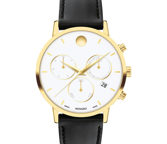 The Movado Museum Classic Quartz 42mm Watch showcases a sleek modern design with a gold rim, white face, black leather strap, and minimalistic hour markers. It features the iconic museum dial with three sub-dials and a date window at 4 o'clock, perfect for those who value both style and functionality.