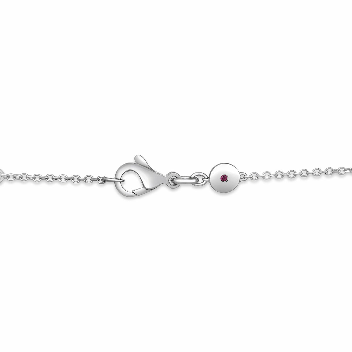 A Roberto Coin 18K White Gold Diamond Cross Necklace featuring a link chain, lobster clasp, and a small circular charm set with a single red gemstone.