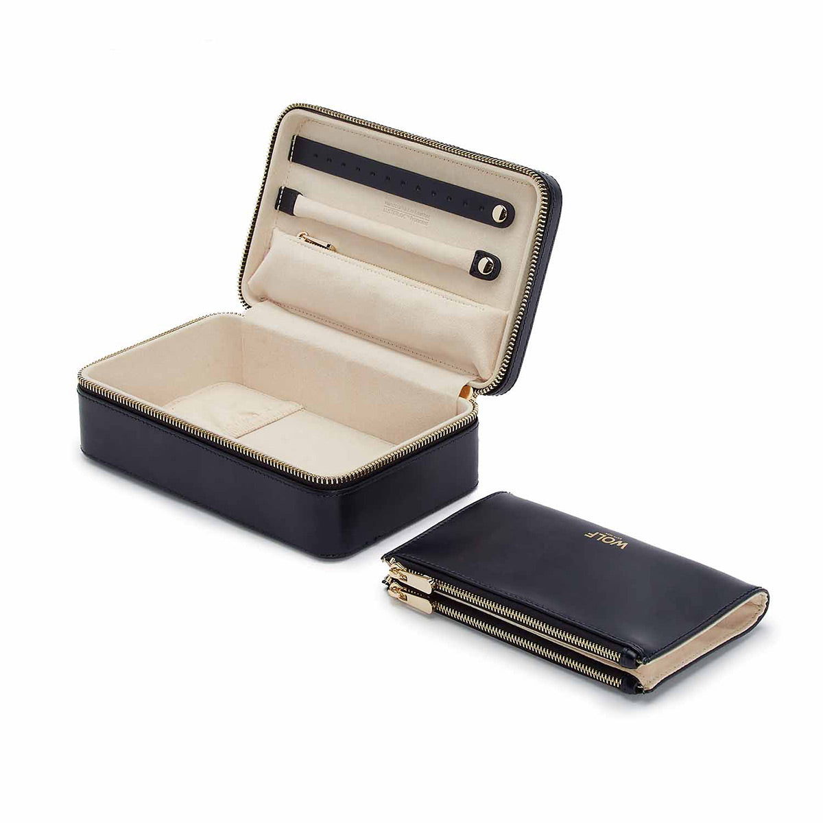 The WOLF 1834 Maria Medium Jewellery Zip Case, featuring a sleek black leather exterior, is open to display its beige interior compartments designed for organizing jewelry. As part of WOLF's exclusive travel collection, another matching closed case lies upside down beside it, highlighting its compact and stylish design.