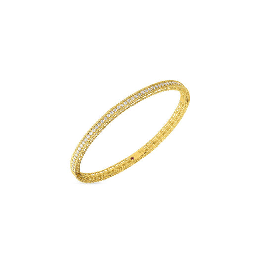 The Roberto Coin Symphony Princess 18K Yellow Gold Diamond Bangle showcases a gold bangle with an intricate mesh design, highlighted by a series of small white gemstones, elegantly displayed against a plain white background, embodying Roberto Coin's signature elegance in 18K yellow gold.