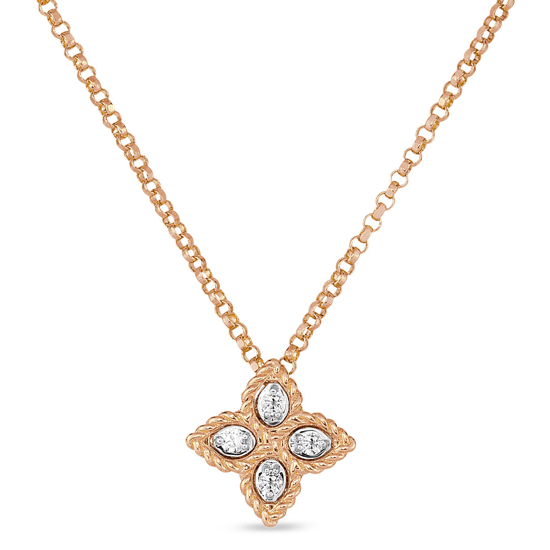 The Roberto Coin Princess Flower Pendant Necklace in 18K Rose Gold features a chain link design with a four-pointed star pendant, adorned with teardrop-shaped clear gems at each point and a central diamond.