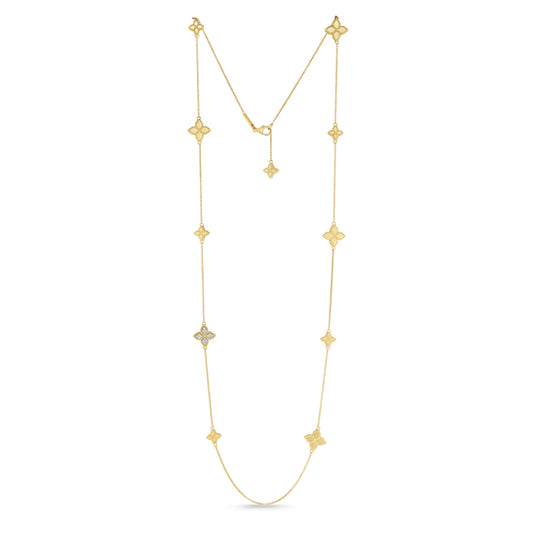 The Roberto Coin Station Necklace with Diamonds features a delicate design in yellow gold, incorporating floral-shaped motifs spaced evenly along the chain. Crafted from 18K gold, this elegant and minimalist piece by Roberto Coin is ideal for adding a subtle touch of sophistication.