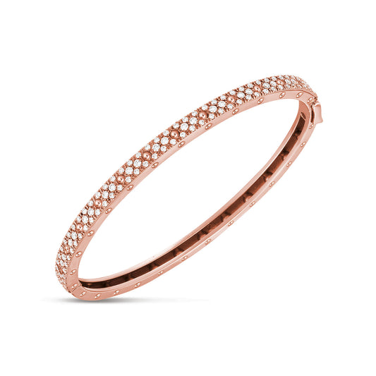A Roberto Coin Pois Moi 18K Rose Gold Diamond Bangle, skillfully designed with a sleek appearance and encrusted with small diamonds, showcases its sparkling surface elegantly.