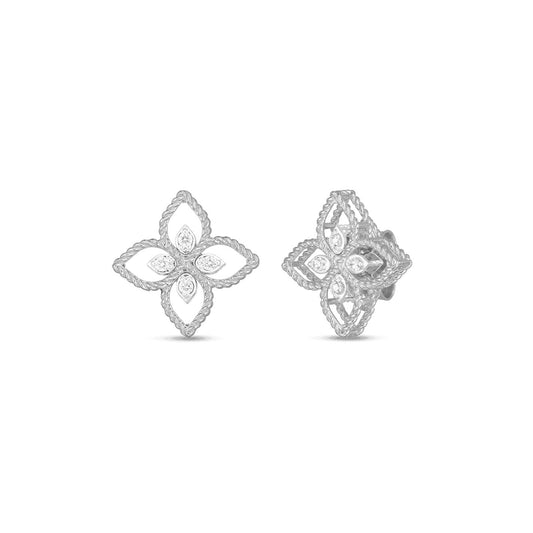 The Roberto Coin 18K White Gold Diamond Princess Flower Stud Earrings highlight a symmetrical floral motif crafted in 18K white gold, adorned with intricate petal-like designs and dazzling accents.