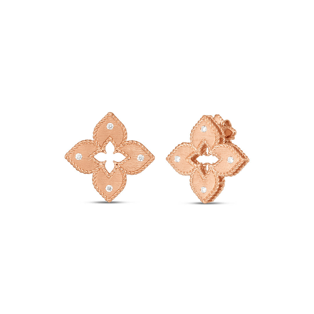 Roberto Coin Petite Venetian Princess Satin Finish 18K Yellow Gold Diamond stud earrings feature a floral design with diamond accents and secure butterfly backs, beautifully displayed on a white background.