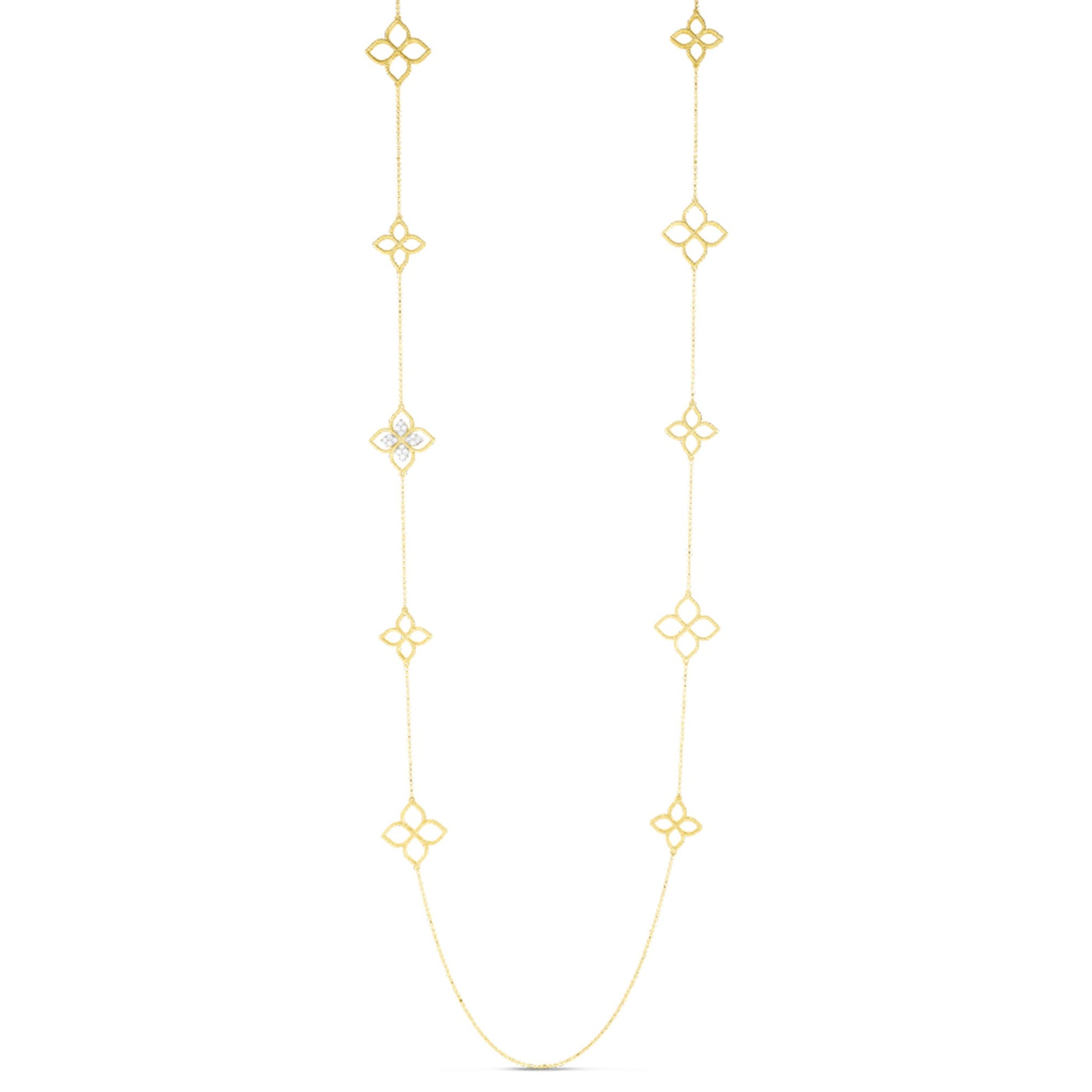 The Roberto Coin Princepessa 18K Yellow Gold Diamond Flower Station Necklace is a 34" necklace with repeating quatrefoil motifs, one accented by 0.16 TCW diamonds, shown on a plain white background.