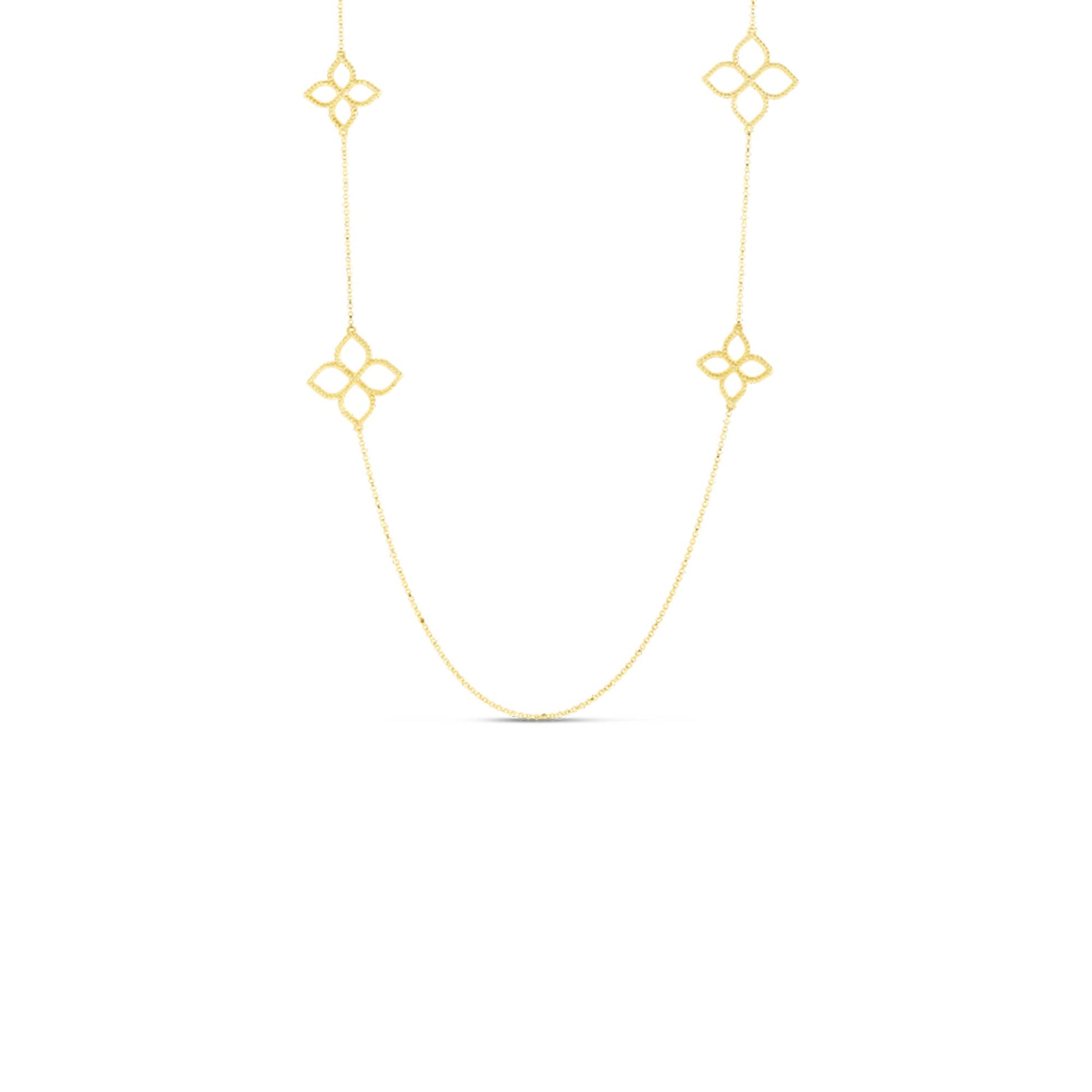 The Roberto Coin Princepessa 18K Yellow Gold Diamond Flower Station Necklace features four diamond flower motifs on a fine 34" gold chain, displayed against a plain white background.