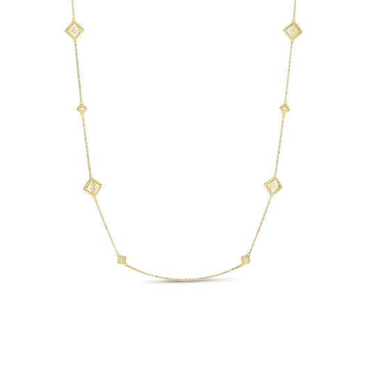 The Roberto Coin Palazzo Ducale 18K Yellow Gold Diamond Station Necklace is an exquisite piece featuring a slender chain adorned with evenly spaced, diamond-shaped links. Each intricately designed link enhances the elegant and minimalist design, creating a timeless accessory that stands out beautifully against a white background.